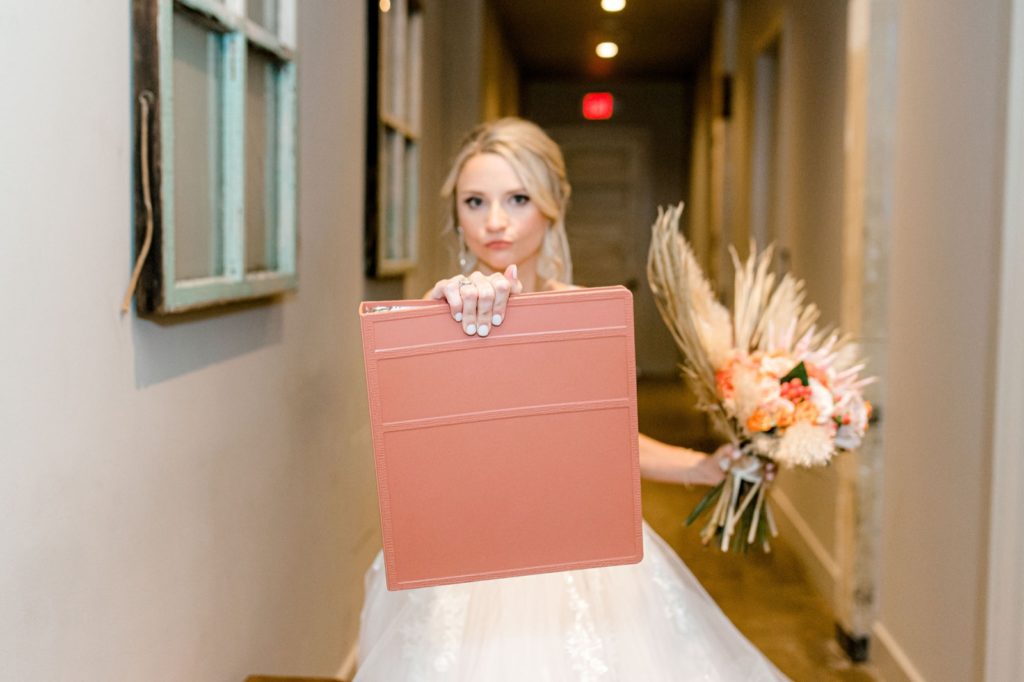 bride with planning binder