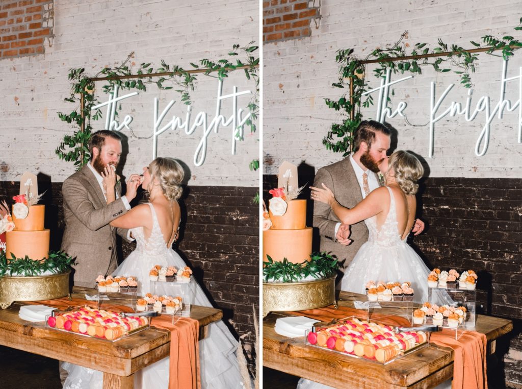 couple cuts wedding cake